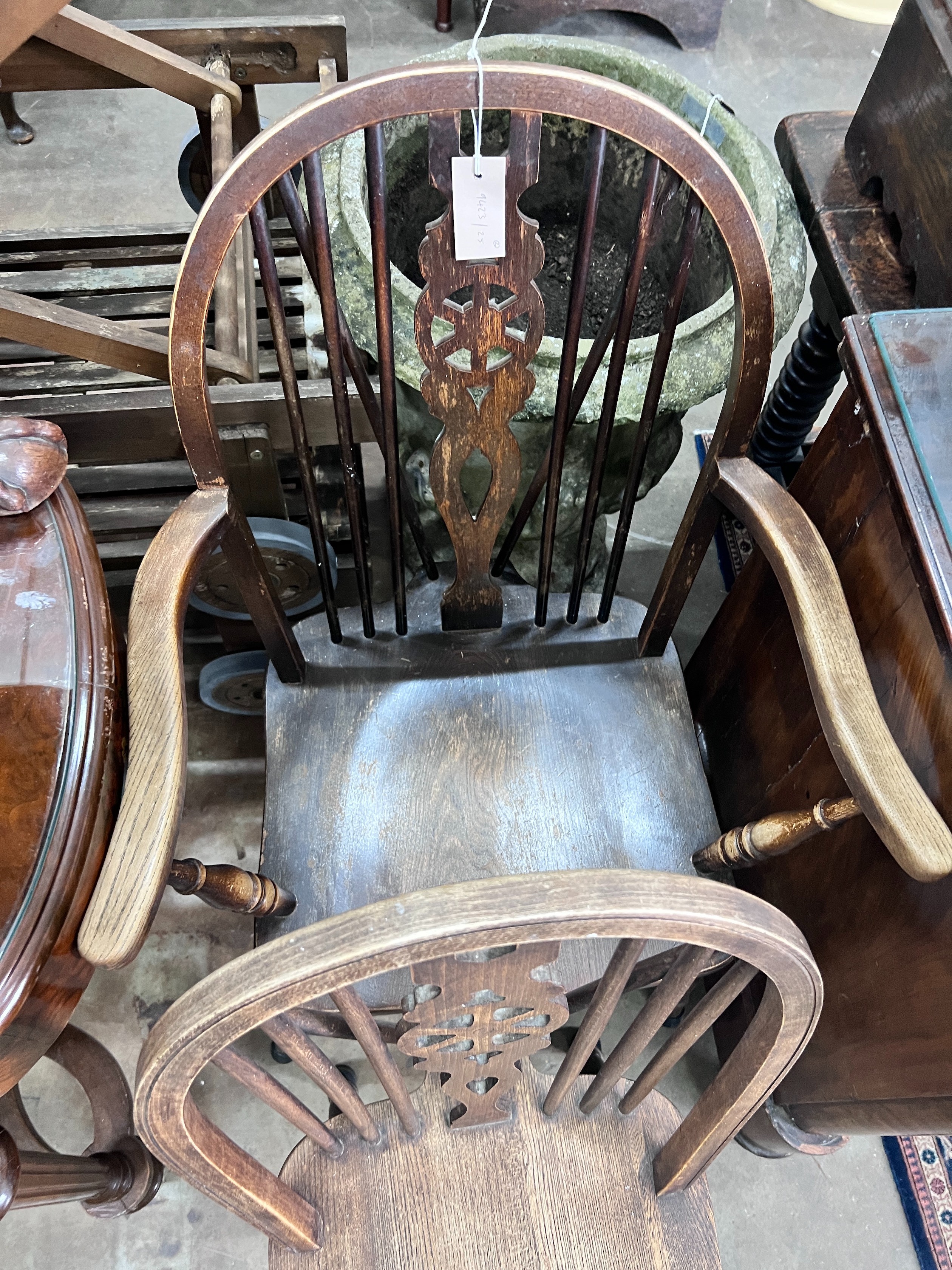 A George III style mahogany tripod table, diameter 49cm, height 60cm, and two wheelback chairs *Please note the sale commences at 9am.